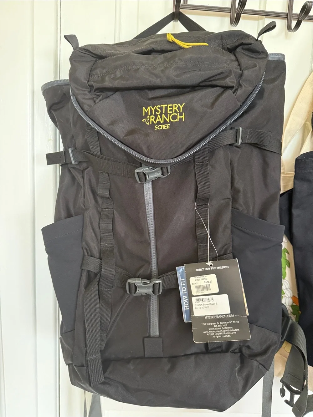 MYSTERY RANCH Scree Backpack in Black with Yellow Accent
